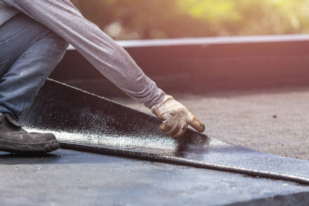 Professional Basement Waterproofing technician working in Ostrander, OH